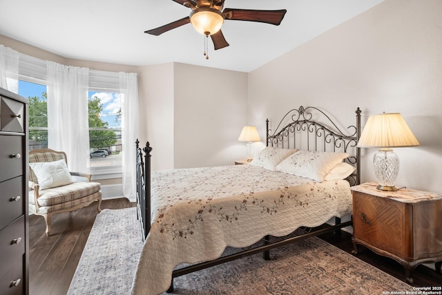 508 Main, Marble Falls, TX 78654 - bedroom with wood finished floors, a ceiling fan, and baseboards