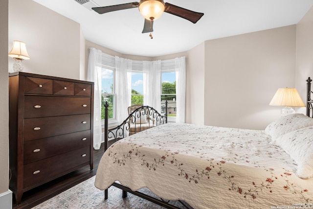 508 Main, Marble Falls, TX 78654 - bedroom with dark wood-style floors and ceiling fan