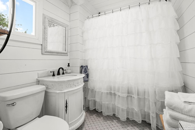 508 Main, Marble Falls, TX 78654 - full bath with toilet, tile patterned flooring, vanity, and curtained shower