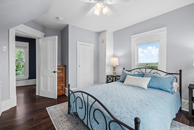 508 Main, Marble Falls, TX 78654 - bedroom with wood finished floors, baseboards, and a ceiling fan