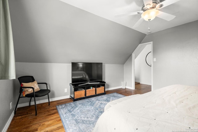508 Main, Marble Falls, TX 78654 - bedroom with wood finished floors, vaulted ceiling, baseboards, and ceiling fan