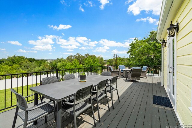 508 Main, Marble Falls, TX 78654 - wooden terrace with outdoor dining area