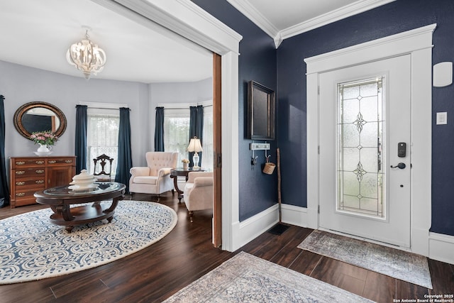 508 Main, Marble Falls, TX 78654 - foyer with wood finished floors, a chandelier, ornamental molding, and baseboards