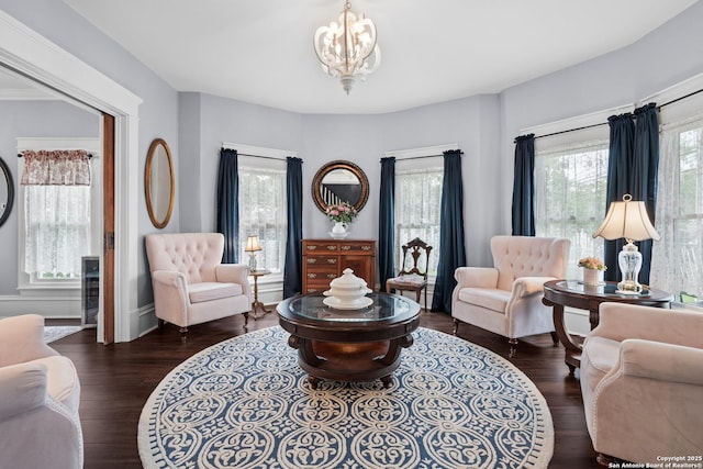 508 Main, Marble Falls, TX 78654 - living area featuring a chandelier and wood finished floors