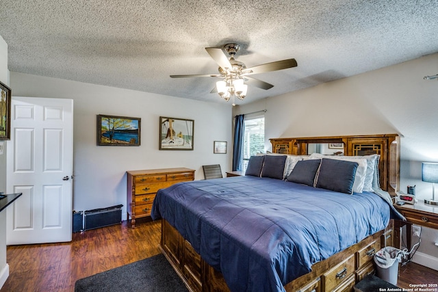 1027 Hedgestone, San Antonio, TX 78258 - bedroom featuring wood finished floors, a textured ceiling, and ceiling fan