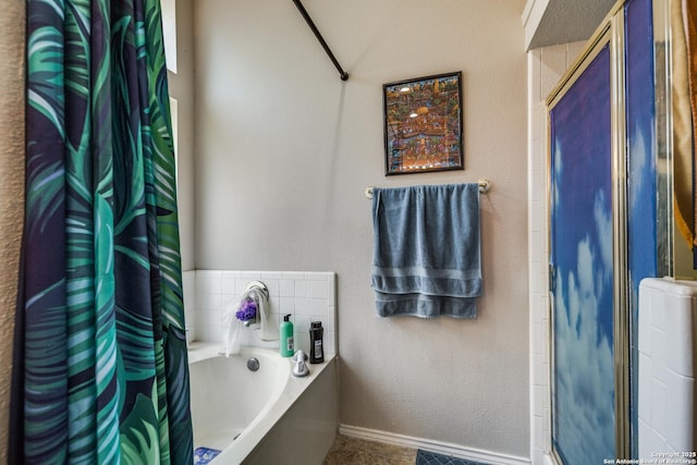 1027 Hedgestone, San Antonio, TX 78258 - full bath featuring a bath, an enclosed shower, and baseboards