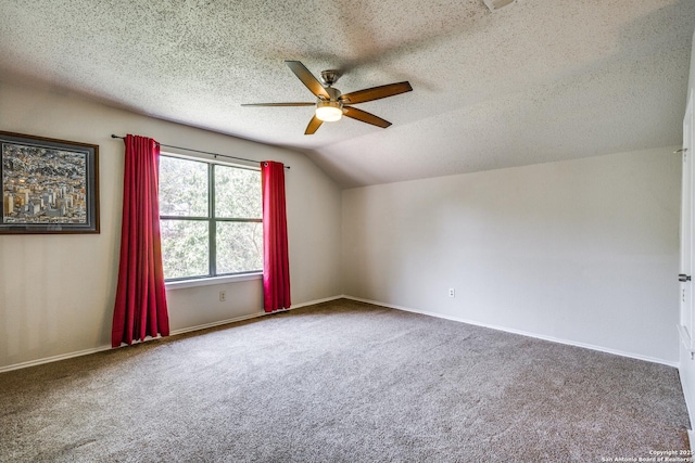 1027 Hedgestone, San Antonio, TX 78258 - additional living space with a ceiling fan, carpet flooring, vaulted ceiling, baseboards, and a textured ceiling