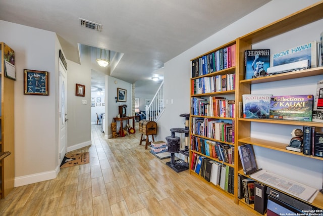 1027 Hedgestone, San Antonio, TX 78258 - entrance foyer with wood finished floors, stairway, and baseboards