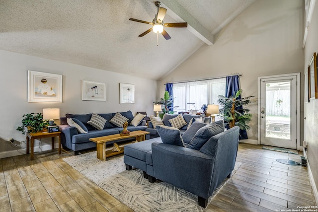 1027 Hedgestone, San Antonio, TX 78258 - living area with beamed ceiling, plenty of natural light, a ceiling fan, high vaulted ceiling, and wood finished floors