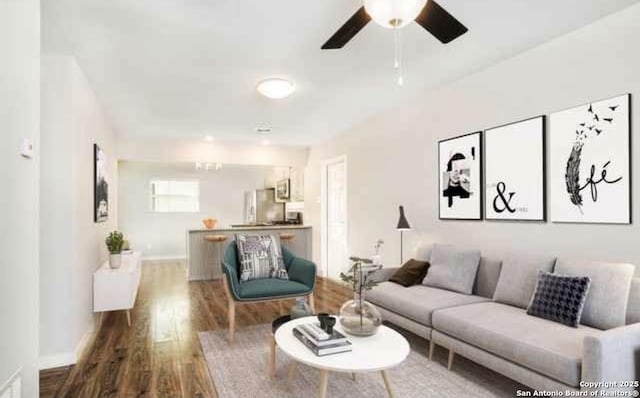 224 Frey, Boerne, TX 78006 - living room featuring wood finished floors, ceiling fan, and baseboards