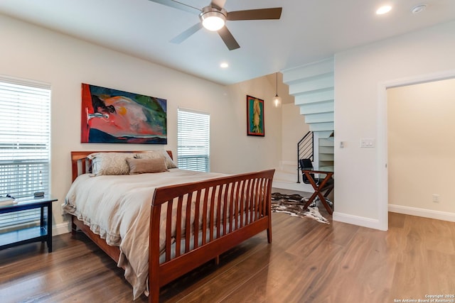 224 Frey, Boerne, TX 78006 - bedroom featuring wood finished floors, multiple windows, baseboards, and recessed lighting