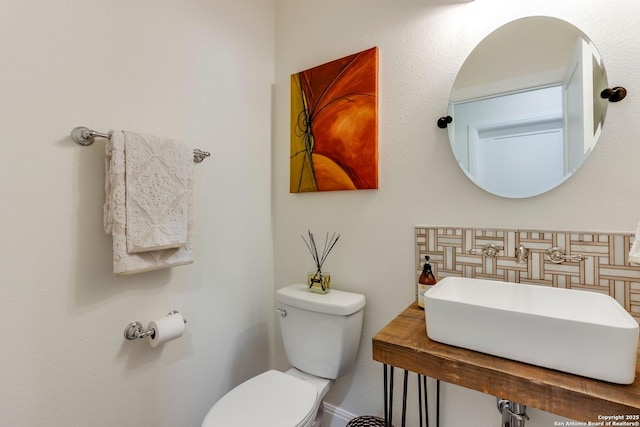 224 Frey, Boerne, TX 78006 - half bathroom featuring a sink and toilet