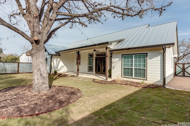 224 Frey, Boerne, TX 78006 - rear view of house featuring french doors, a ceiling fan, a standing seam roof, metal roof, and a patio area