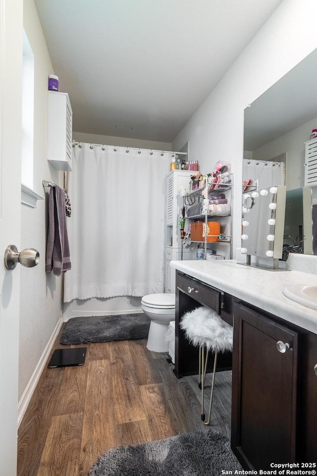 14718 Fronted Goose, San Antonio, TX 78253 - bathroom featuring vanity, wood finished floors, toilet, and curtained shower