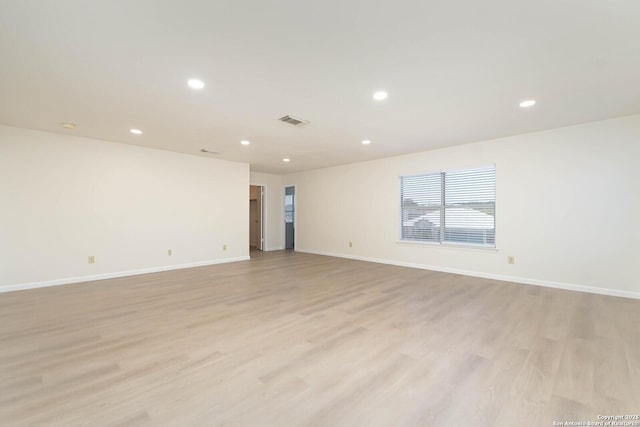 5118 Kayla Brk, San Antonio, TX 78251 - empty room with recessed lighting, light wood-style floors, and baseboards