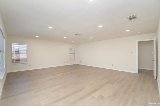 5118 Kayla Brk, San Antonio, TX 78251 - unfurnished room with light wood-style flooring, recessed lighting, and baseboards