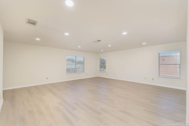 5118 Kayla Brk, San Antonio, TX 78251 - spare room featuring light wood finished floors, recessed lighting, and baseboards