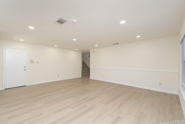 5118 Kayla Brk, San Antonio, TX 78251 - empty room with light wood-style floors, stairs, recessed lighting, and baseboards
