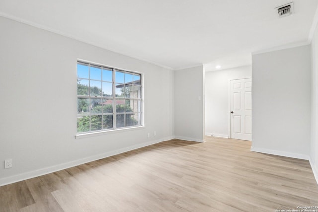 7143 Laurel Valley Dr, San Antonio, TX 78242 - unfurnished room with light wood-type flooring, baseboards, and ornamental molding