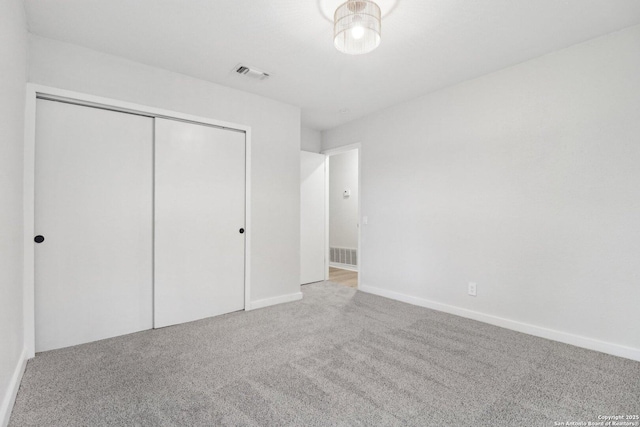 7143 Laurel Valley Dr, San Antonio, TX 78242 - unfurnished bedroom with carpet flooring, a closet, and baseboards