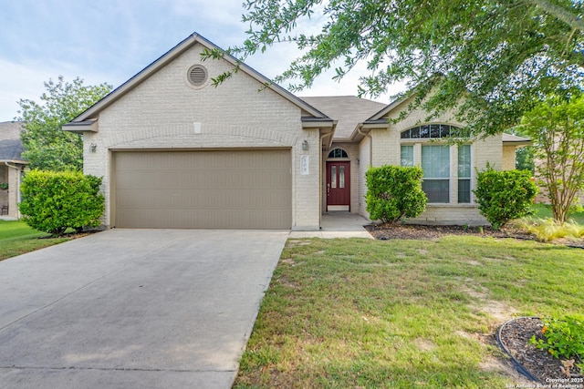 109 Sage Cyn, Boerne, TX 78006 - ranch-style home with brick siding, a garage, driveway, and a front yard