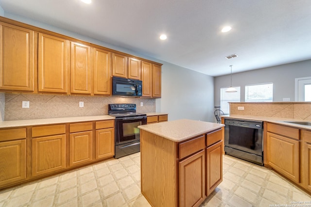 109 Sage Cyn, Boerne, TX 78006 - kitchen with black appliances, light flooring, light countertops, tasteful backsplash, and recessed lighting