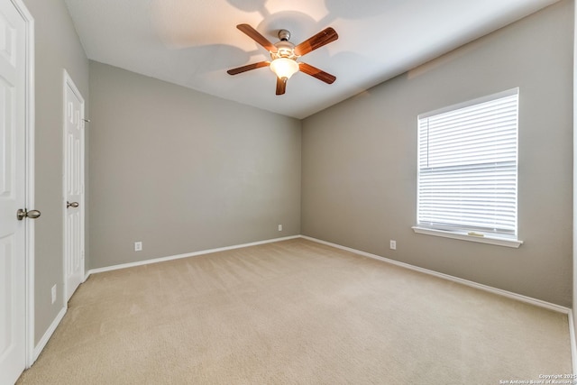 109 Sage Cyn, Boerne, TX 78006 - unfurnished room with a ceiling fan, light colored carpet, and baseboards