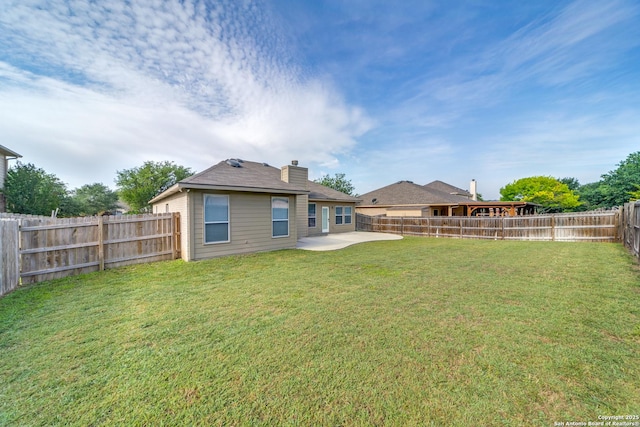 109 Sage Cyn, Boerne, TX 78006 - back of house featuring a patio and a chimney