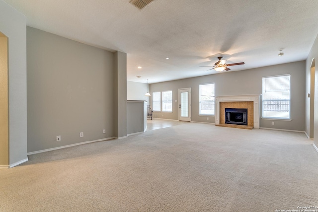 109 Sage Cyn, Boerne, TX 78006 - unfurnished living room featuring ceiling fan, light carpet, and baseboards