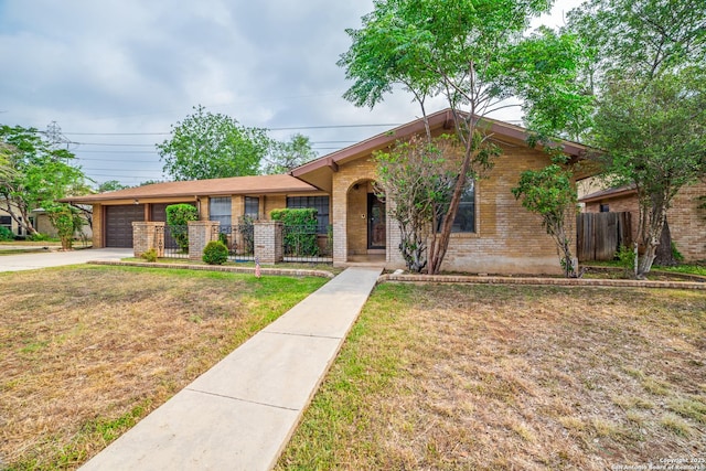 2523 Turkey Oak, San Antonio, TX 78232 - ranch-style home featuring a garage, brick siding, and driveway