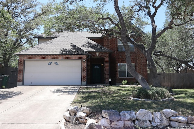 18623 Paloma Wood, San Antonio, TX 78259 - view of front of home with roof with shingles, an attached garage, concrete driveway, and brick siding