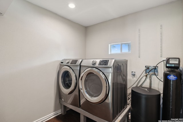 laundry room with washer and dryer, recessed lighting, baseboards, and dark wood-style flooring