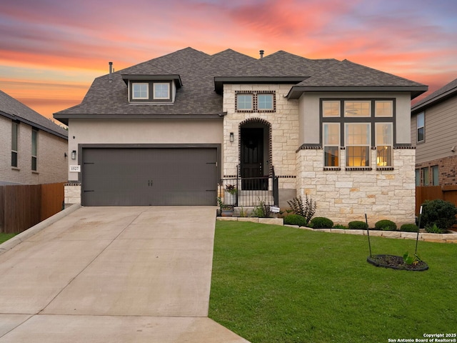 1527 Balcones Fault, New Braunfels, TX 78132 - french provincial home with stone siding, an attached garage, roof with shingles, and driveway