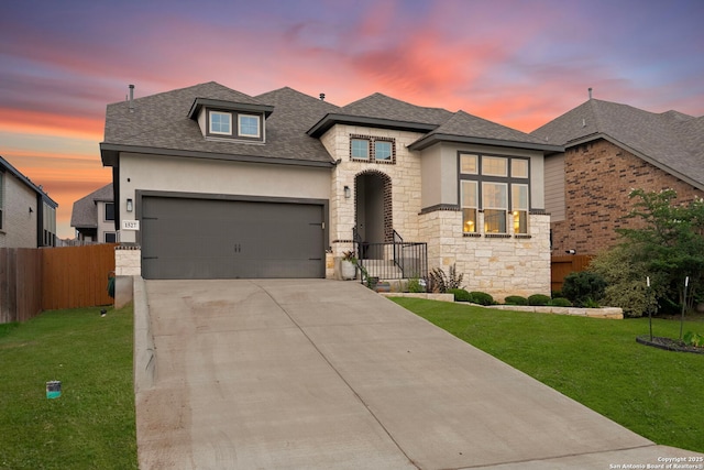 1527 Balcones Fault, New Braunfels, TX 78132 - french provincial home featuring stone siding, concrete driveway, a garage, and stucco siding