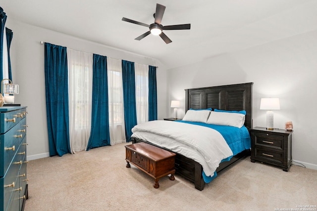 1527 Balcones Fault, New Braunfels, TX 78132 - bedroom with light colored carpet, baseboards, and ceiling fan