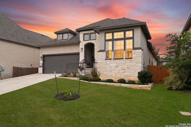 1527 Balcones Fault, New Braunfels, TX 78132 - french country inspired facade featuring stone siding, driveway, a shingled roof, and an attached garage