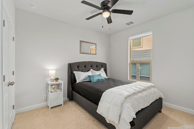 1527 Balcones Fault, New Braunfels, TX 78132 - bedroom with light colored carpet, baseboards, and a ceiling fan