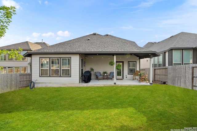 1527 Balcones Fault, New Braunfels, TX 78132 - back of house with a shingled roof and a patio area