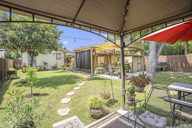 715 E Southcross, San Antonio, TX 78214 - view of yard featuring a patio area, a gazebo, and central air condition unit