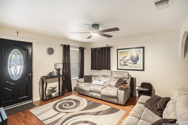 715 E Southcross, San Antonio, TX 78214 - living room featuring ceiling fan, wood finished floors, and baseboards