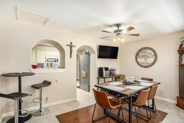 715 E Southcross, San Antonio, TX 78214 - dining room with ceiling fan and baseboards