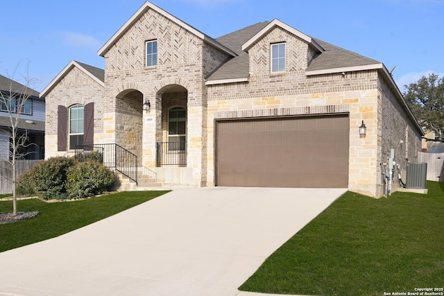 10809 Davis Farms, San Antonio, TX 78254 - french provincial home with brick siding, driveway, a front yard, and an attached garage