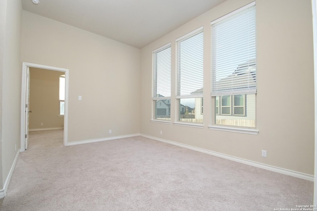 10809 Davis Farms, San Antonio, TX 78254 - carpeted empty room featuring baseboards and lofted ceiling