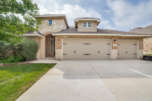2010 Bailey Frst, San Antonio, TX 78253 - view of front of house featuring stone siding, an attached garage, a shingled roof, driveway, and brick siding