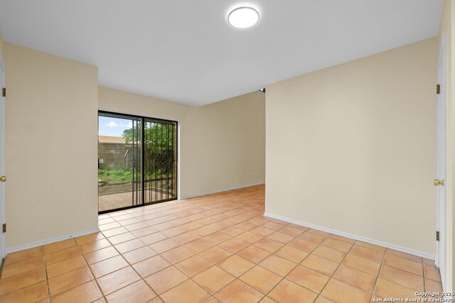 6123 Farragut, San Antonio, TX 78238 - empty room with light tile patterned flooring and baseboards