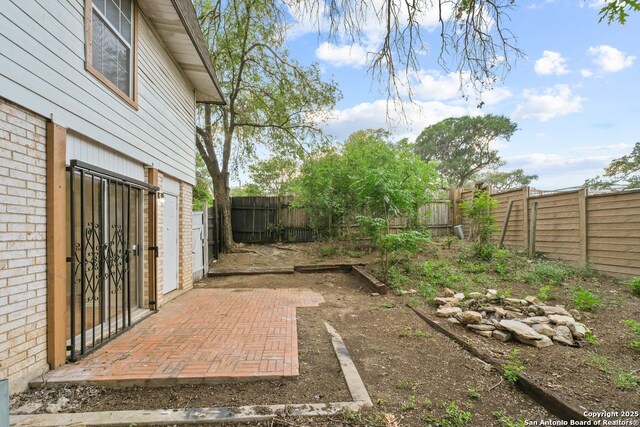 6123 Farragut, San Antonio, TX 78238 - fenced backyard with a patio