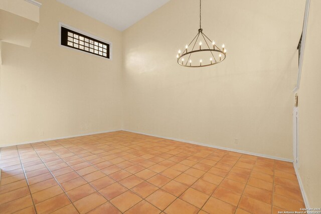 6123 Farragut, San Antonio, TX 78238 - spare room with a chandelier, light tile patterned flooring, and baseboards