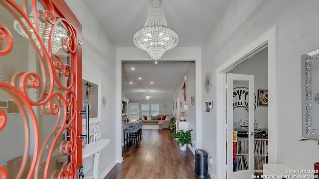 10535 Penelope, Converse, TX 78109 - foyer featuring a chandelier and wood finished floors