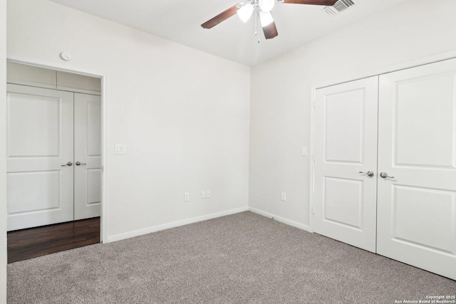 306 Joe Blanks St, San Antonio, TX 78237 - unfurnished bedroom featuring carpet flooring, baseboards, a ceiling fan, and a closet