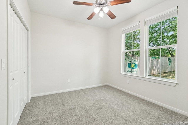 306 Joe Blanks St, San Antonio, TX 78237 - unfurnished bedroom featuring light carpet, baseboards, and a closet